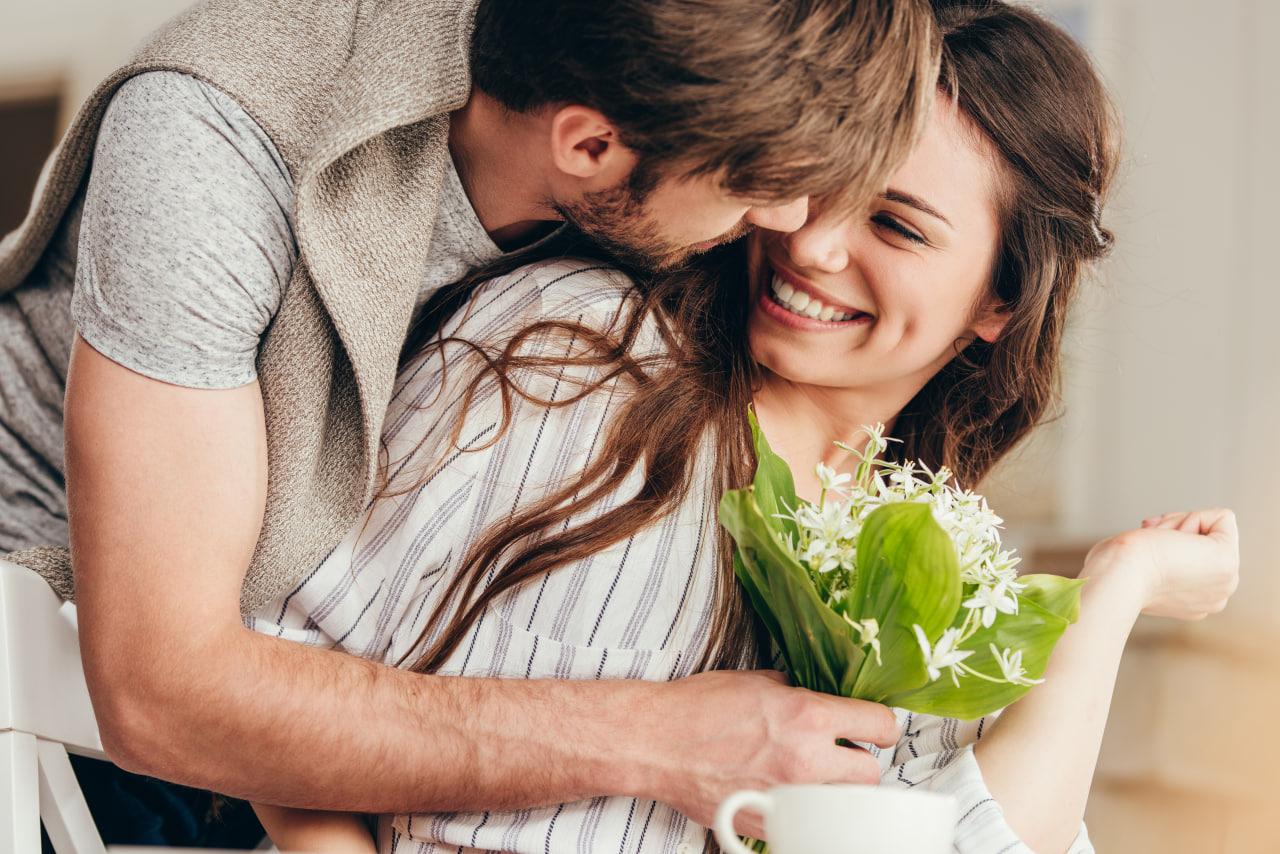 smiling woman with loving man together